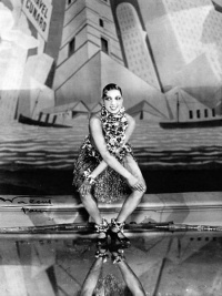 Josephine Baker dancing the charleston at the Folies Bergère in Paris for La Revue nègre in 1926. Notice the art deco background. (Photo by Walery)