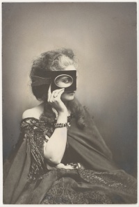 Scherzo di Follia (circa 1863-66): Virginia Oldoini, Countess of Castiglione looks at the camera through an small oval picture frame, isolating one of her eyes.