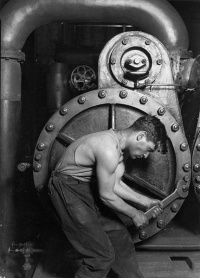This page Production is part of the utility series. Illustration: Powerhouse mechanic working on steam pump, 1920 