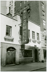 The Stonewall Inn, taken September 1969. The sign in the window reads: "We homosexuals plead with our people to please help maintain peaceful and quiet conduct on the streets of the Village—Mattachine".